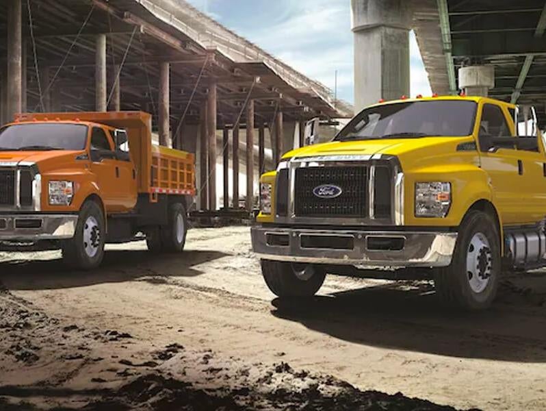 image of 2 Ford trucks